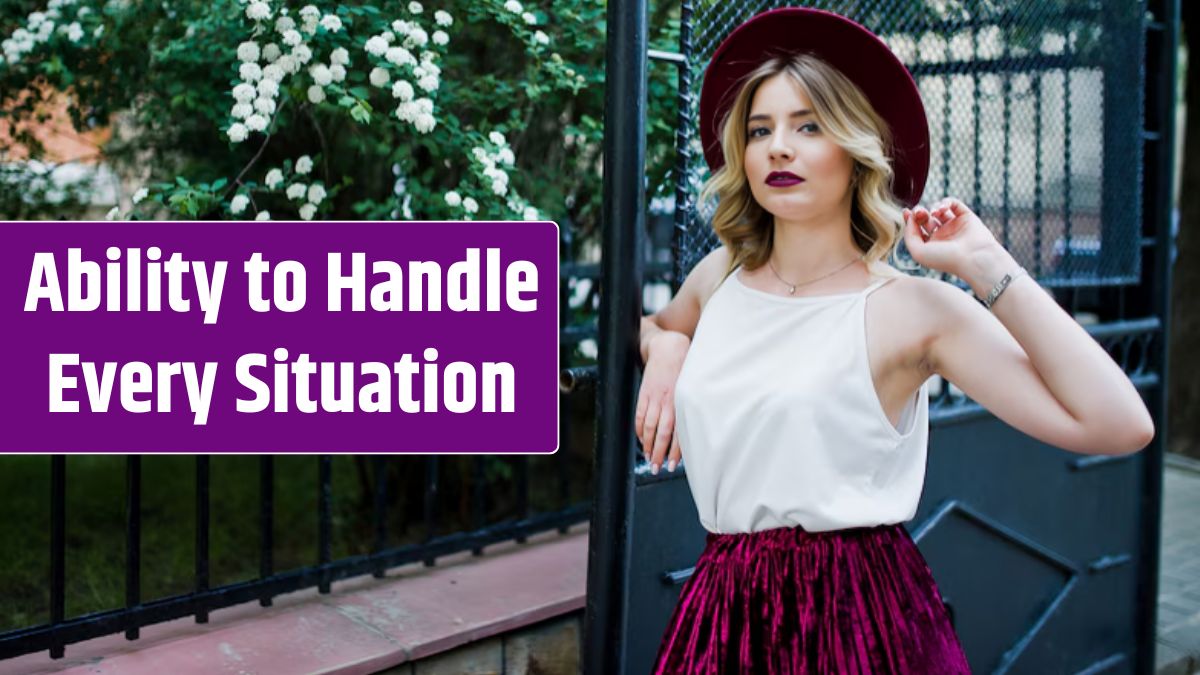 Fashionable and beautiful blonde model girl in stylish red velvet velour skirt, white blouse and hat, posing outdoor against gates.