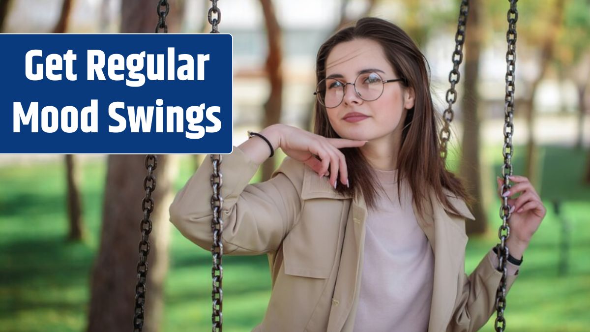 Portrait of a stylish girl in glasses, closeup. Leisure. Beautiful woman while sitting on a swing.