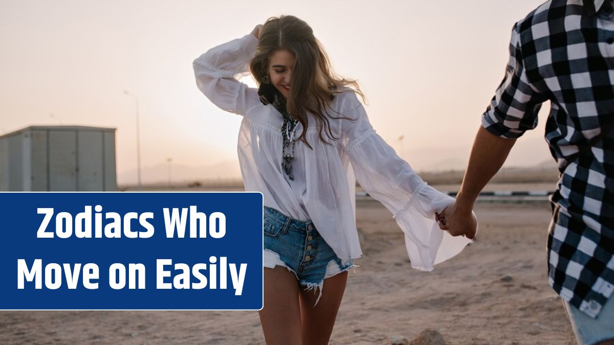 Young loving laughing couple in trendy clothes running on sand holding hands at sunset.
