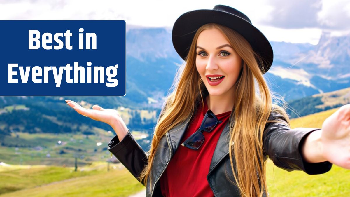 Pretty cheerful young tourist woman wearing stylish leather jacket and trendy hat and showing amazing view on Austrian Alp mountains.
